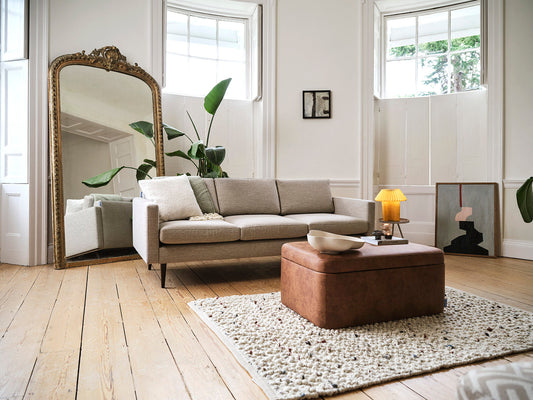 grey sofa and storage ottoman