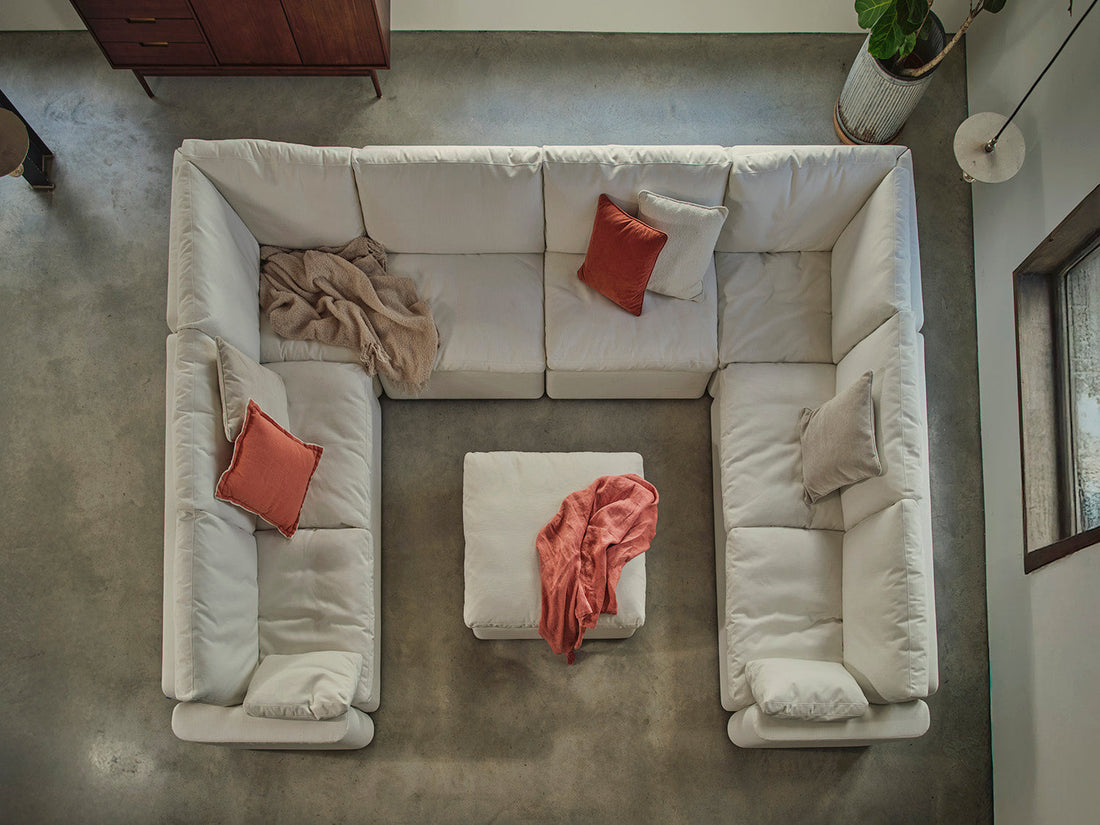 U Shaped White sofa with ottoman