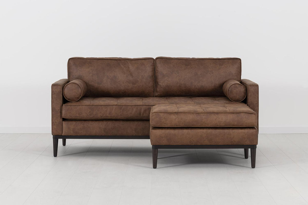 Ottoman in brown faux leather