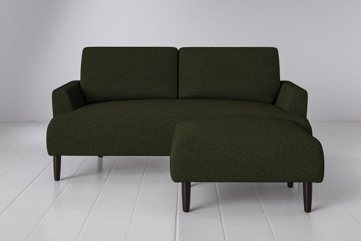 Ottoman in green bouclé
