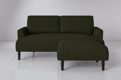 Ottoman in green bouclé