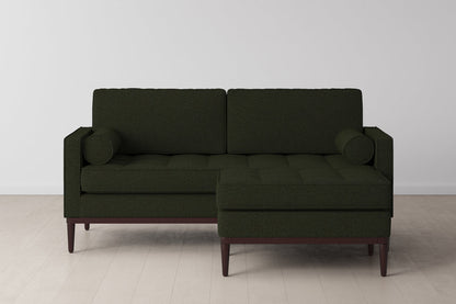 Ottoman in green bouclé