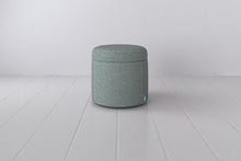 Storage Ottoman in blue linen